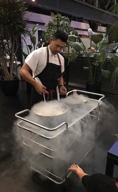 Founder and Chef Winston Chiu cooking with dry ice