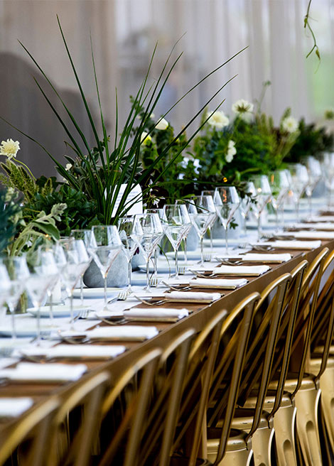 Bonbite catering dinner table setting diagnal long shot at the Brookly Grange in the Brooklyn Navy Yard
